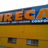 Rótulo cartel Ireca El Manchón Sevilla. Texto letras en aluminio recortado