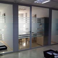 Ácido Oficinas centrales de Clínicas Medicaldent Franquicias. Rotulación de vinilos en Sevilla