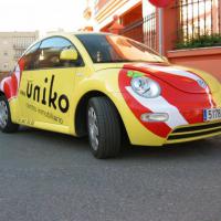 Inmobiliarias Uniko Dos Hermanas Sevilla. Rotulación en vinilo fundido de corte.