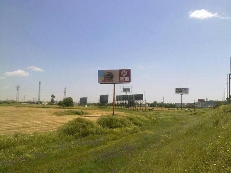 R&oacute;tulo cartel Se&ntilde;alizaci&oacute;n sobre Monoposte Burguer King Sevilla