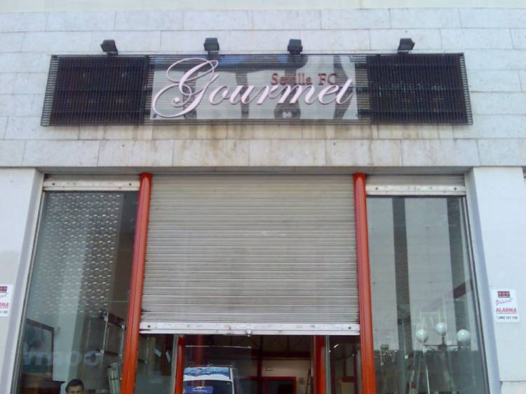 R&oacute;tulo corp&oacute;reo Gournet Sevilla FC