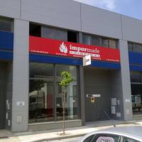 Rotulación de fachada Impormade chimeneas, polígono Pisa Sevilla