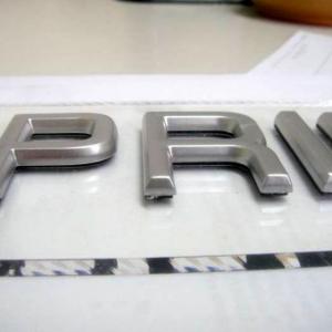 Rótulo cartel Letras en resina con baño de aluminio