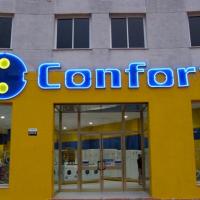 Rótulo de letras y logos de neón pírex. Tiendas Confort Dos Hermanas Sevilla