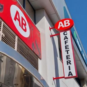 Rótulo cartel tipo banderola para Café AB en Sevilla. Rótulo cartel tipo banderola para Café AB en Sevilla.