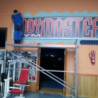 Cartel lona publicitaria de Gran formato. Gim Bodymaster Dos Hermanas Sevilla