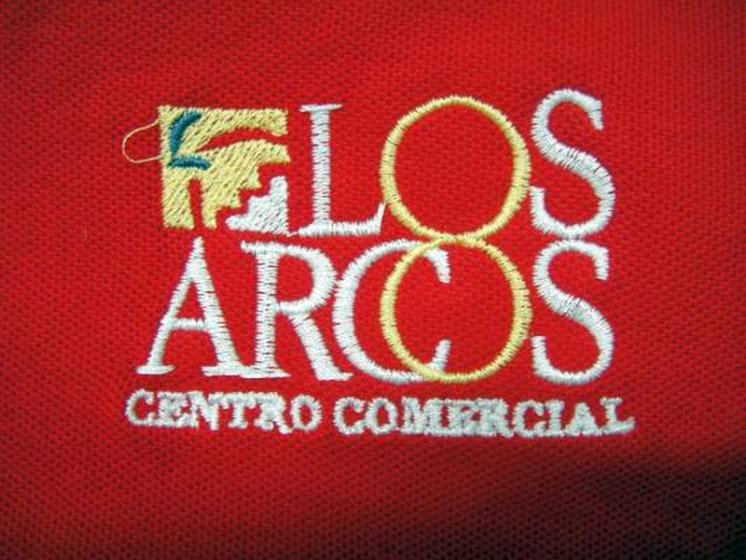 Bordado de Vestuario Laboral para Acciona Service. Servicio integral de Centros Comerciales. Sevilla