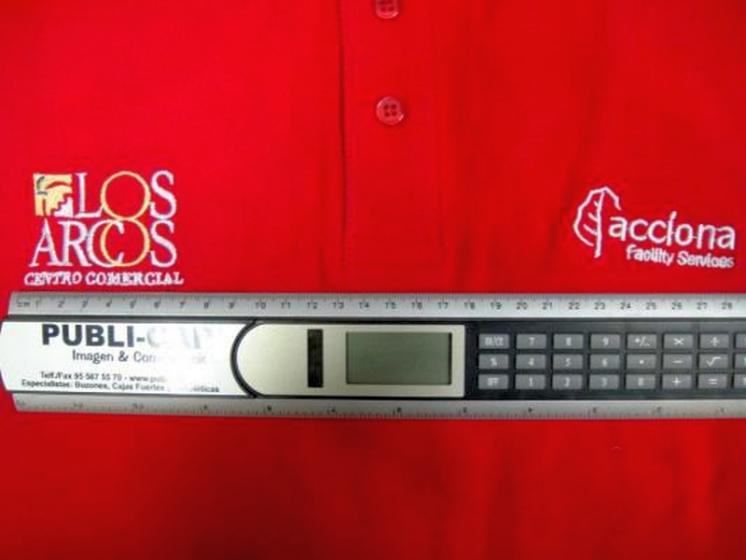 Bordado de Vestuario Laboral para Acciona Service. Servicio integral de Centros Comerciales. Sevilla