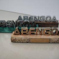 Regalo trafeo insignia de protocolo para Abengoa Sevilla.En marmolina 