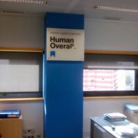 Rótulo cartel con rotulación Human Overall, Sevilla
