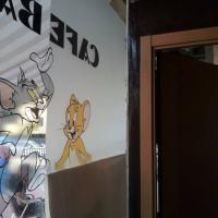 Tom y Jerry Sevilla.  Rotulación de vinilos en impresión digital y al ácido