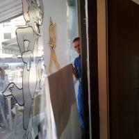 Tom y Jerry Sevilla.  Rotulación de vinilos en impresión digital y al ácido