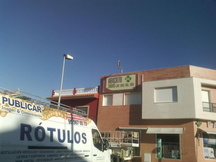 Cartel lona publicitaria de Gran formato. Farmacia Cabezuelos, Dos Hermanas Sevilla