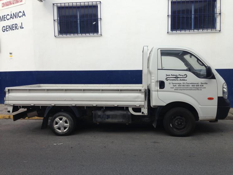 Rotulación camión Juan Antonio Pérez. Carpintería Metálica, Torreblanca Sevilla