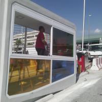 Rotulación de Cabinas de entrada a Mercasevilla. Trabajos realizados para Nicolás Escalona Construcciones.  Rotulación de vinilos traslúcidos