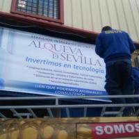 Cartel lona publicitaria de Gran formato tensada y enmarcada para Alqueva Sevilla