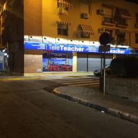 Cartel rótulo frontal, rotulado con vinilos e iluminados con focos led. Tele Teacher academia Dos Hermanas Sevilla