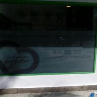 Rotulación de cristales y escaparates. Clínicas Dental Oral Salud Dos Hermanas Sevilla