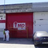 Rotulación de puerta de MP en Sevilla.