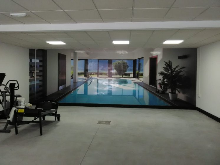 Rotulación de foto mural en vinilo especial de pared laminado.Garaje parking en Dos Hermanas Sevilla.
