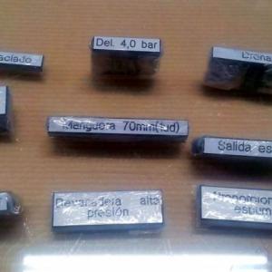 Placas grabadas en pvc bicapa para cuadros sinópticos. Sevilla