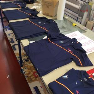 Polo técnico con bandera de España y transfer. Rtem Hispalis Sevilla