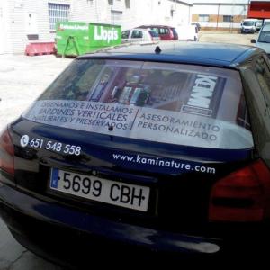 Rotulación de luneta en vinilo microperforado homologado. Kaminature Sevilla.