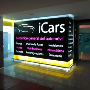 Rótulo cartel Caja luminosa rotulada con vinilos traslúcidos. Icars Sevilla. 