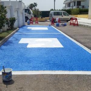 Rótulo señalizador plaza parking de minusválido. Pintura especial suelo para Hotel Simón Verde Sevilla.