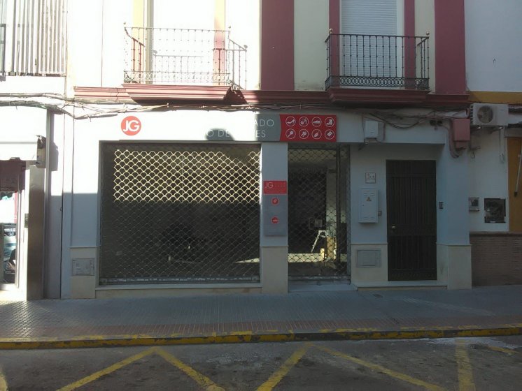 Rotulaci&oacute;n en vinilos de fachada sobre bandeja de dib&oacute;n. Reparaci&oacute;n de Zapatos y llaves en Dos Hermanas Sevilla. 