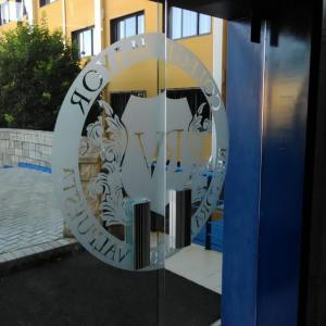 Rotulación de cristales en Colegio Mayor de Sevilla.