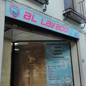 Rótulo cartel en bandeja plegada en comsopiste. Al lavado en Utrera Sevilla.