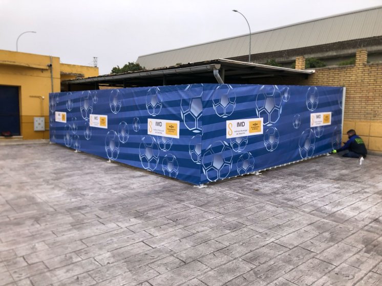 Lonas para cubrir vallas. Trabajos para Falusa en Sevilla.