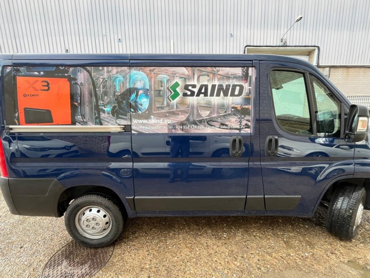 Rotulación de camión en vinilo impreso, laminado UV y recortado para Saind en Sevilla.