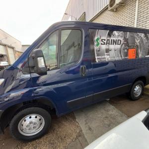Rotulación de camión en vinilo impreso, laminado UV y recortado para Saind en Sevilla.